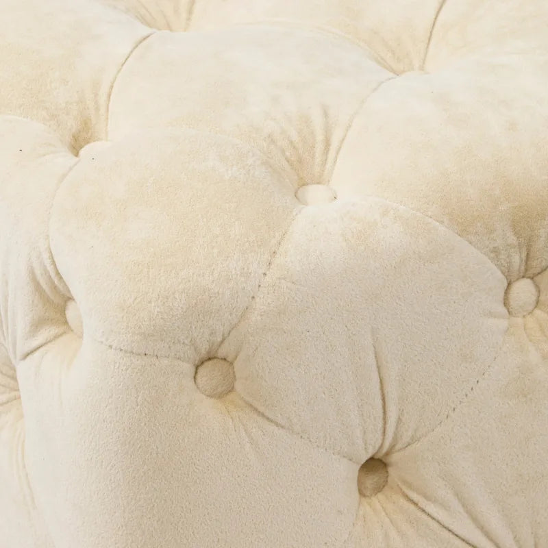 Pouf carré capitonné en velours moderne